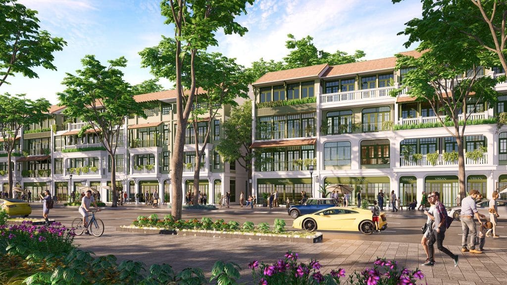 Hình ảnh dãy townhouse tại Sun Bắc Ninh với kiến trúc 4 tầng, mặt tiền thoáng, tầng trệt là các cửa hàng tiện lợi, phía trước có đường lớn, cây xanh và cư dân vui chơi, dạo bộ.